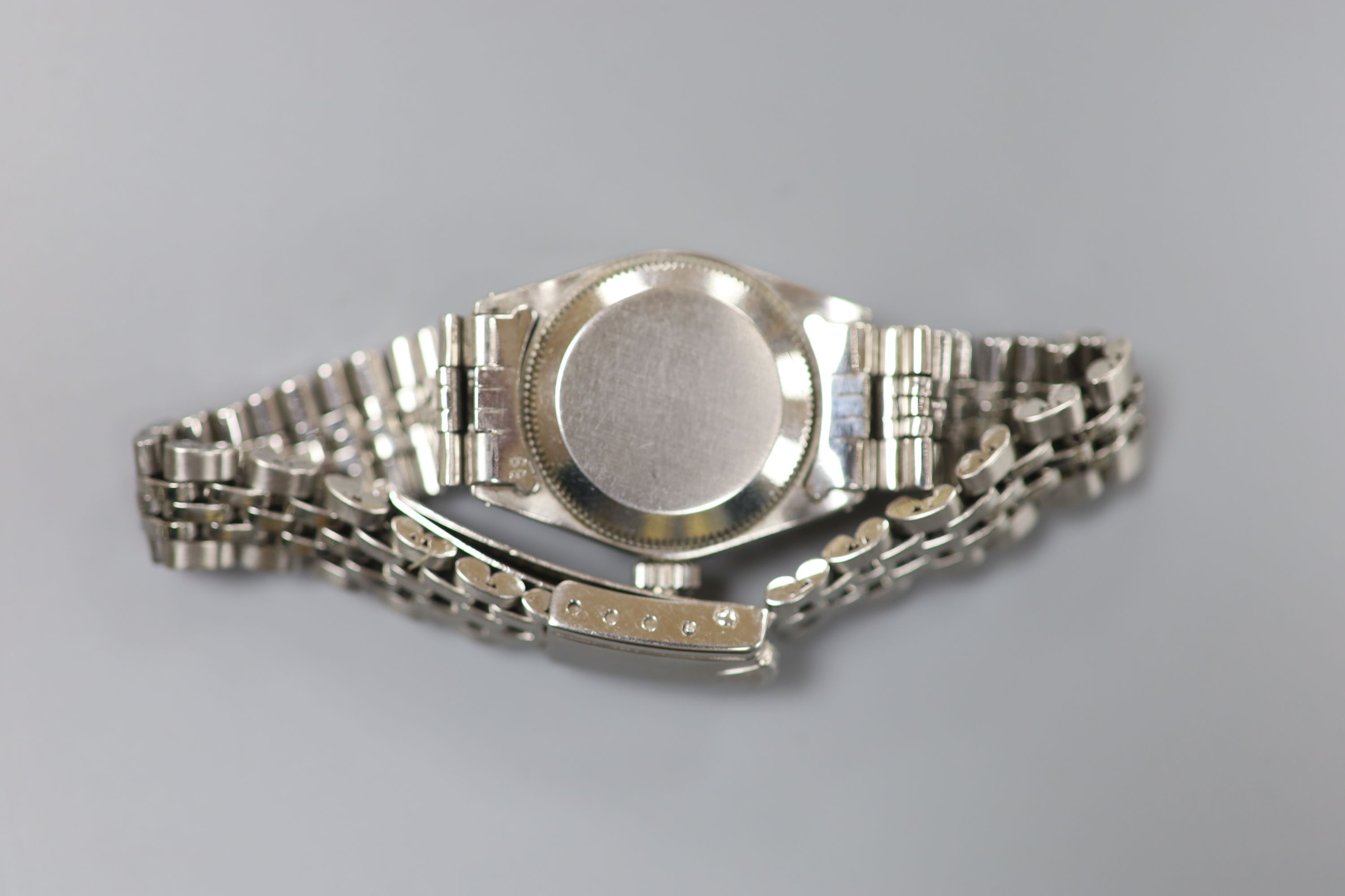 A ladys 1960s stainless steel Rolex Oyster Perpetual Date wrist watch, on Rolex bracelet, model no. 6517, serial no.1529297,